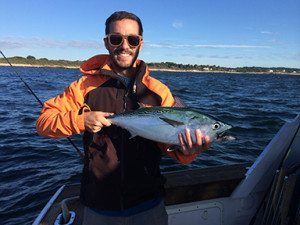 Eric Spicer '07 spent a lunch period with students discussing his post-Academy trajectory in the outdoor recreation industry. Photo property of Oliver Hazard Perry Education at Sea.